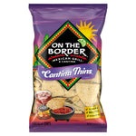 Packaging of 'On The Border Cantina Thins' tortilla chips with purple border and colorful design.