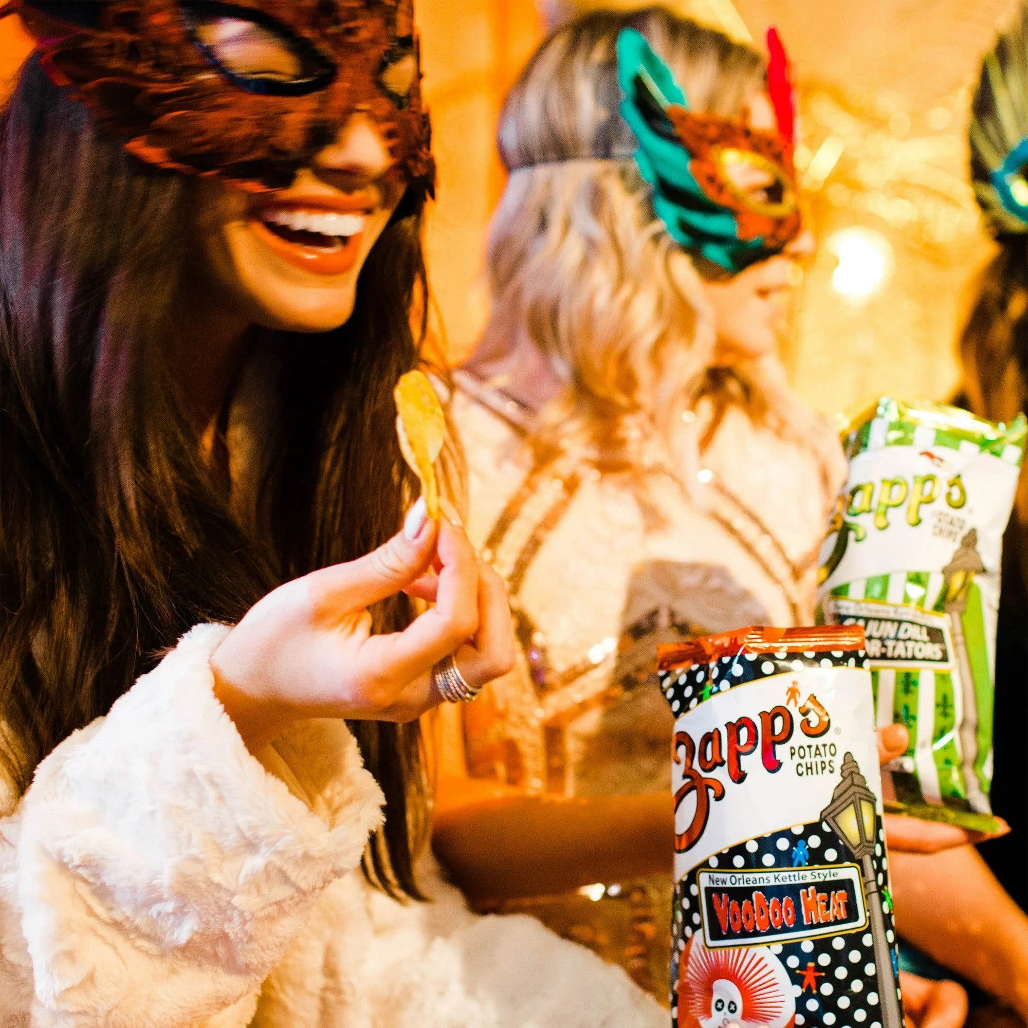 Person wearing a mask with Zapp's potato chips in the foreground