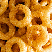 Close-up of round, golden-brown cereal loops.